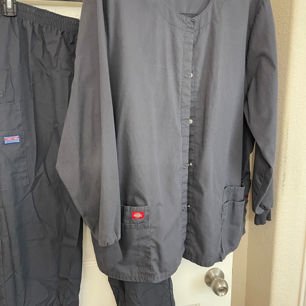 4 sets of scrubs and 1 jacket